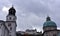 The view of the fortress Hohen Salzburg under dark rain clouds