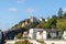 View at Fortress Veste Oberhaus and buildings on Danube shore in Passau, Bavaria, Germany in autumn