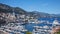 View of France and Italy through the port of Monaco and part of the state of Monaco.