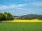 View of Franconian Switzerland in spring with Rape field