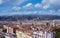 View of the French city of Nice from the observation deck of the fortress. Mountains, sky and rooftops on a sunny day