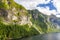 View on Friarfossen waterfall in Geiranger fjord from cruise ship in summer