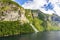 View on Friarfossen waterfall in Geiranger fjord from cruise ship in summer