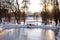 View of frozen cascading ponds and a wedding bridge in the park