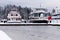 A View of frozen dock with boats in Coal Harbour. Vancouver authentic paddle wheeler `Constitution`