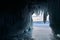 View of Frozen Lake Baikal from Blue Ice Cave with Icicles in Russia