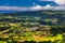 View of Furnas town and lake Lagoa das Furnas on Sao Miguel Island, Azores, Portugal from the Miradouro do Salto do Cavalo