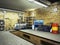 View of a Garage 3D Interior with Opened Roller Door 3D Rendering