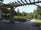 View of  gate, path and trees in the park  in Tallinn