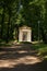 View gazebo with a statue in the city Park. The Village Of Arkhangelsk. Russia.