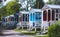 View of german camping place with tents, caravans, trailer park and cabin cottage houses