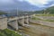 View of Germasogeia dam`s overflow in spring when the water is gushing out of the reservoir