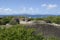 The view of giant boulders with Tortola in the background from above The Baths, Virgin Gorda, BVI