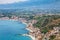 View of Giardini Naxos town on Ionian Sea beach