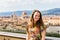 View of a girl at the Michelangelo Square in Florence in Italy