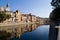 View Girona city with colorful houses reflected in water of ony