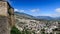 View of Gjirocaster old historical city center set in mountain slope with fortification wall from Gjirocaster castle, Gjirocaster