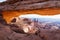 View through the glowing Mesa Arch towards the Washerwoman Arch in the center