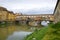 View of the Golden Bridge on a cloudy September day. Florence, Italy