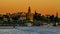 View of Golden Tower Torre del Oro of Seville, Andalusia, Spain over river Guadalquivir at sunset