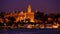 View of Golden Tower Torre del Oro of Seville, Andalusia, Spain over river Guadalquivir at sunset