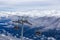 View of the Gondola going up the Mountain with Canadian Mountain Landscape