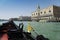 View from gondola trip during the ride through the canals with San Marco district background in Venice Italy