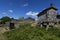 View of the granaries espigueiros and medieval castle in the historic village of Lindoso