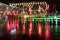 A view of Grand Canal Square at night in Dublin`s regenerated Docklands with red columns standing randomly. Ireland September 201