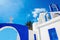 A view of a Greek church with iconic blue colors on Greek island