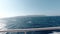 View of Greek island from ship travelling in the Aegean sea in slow motion