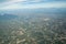 The view of green field and farm and city downtown in middle of Thailand. It shot from Jetplane