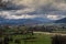 View of the green fields of the mountains and the village in. countryside in Bosnia, beautiful landscape. Travel to the Balkans