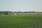 View of green meadow landscape and houses in Germany rural area