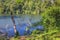 View of green mountains with a Crater Lake and the reflections on the water, Rweteera, Fort Portal, Uganda