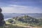 View of green mountains with a Crater Lake and the reflections on the water, Rweteera, Fort Portal, Uganda