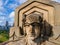 View of Guardian of Traffic statue face and downtown Cleveland