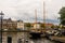 View of Haarlem embankment on Spaarne river with moored sail boats