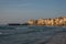 View on habour and old houses in Cefalu at sunset, Sicily.