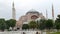 View of the Hagia Sophia in Istanbul, Turkey over which seagulls fly. The historical temple of various religions of