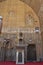 View of the hall and mihrab  decorated with lanterns and colorful marble in sultan Hassan mosque