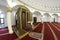 View of hall for praying iwan of the Ar-Rahma Mosque Mercy Mosque with minbar pulpit. Kyiv, Ukraine