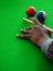 View of Hand of Player playing billiards game