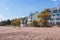 View of Hanko town coast, Hango, Finland, with beach and coastal waterfront, wooden houses and beach changing cabins, Uusimaa,