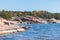 View of Hanko town coast, Hango, Finland, with beach and coastal waterfront, wooden houses and beach changing cabins, Uusimaa,