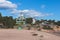 View of Hanko town coast, Hango, Finland, with beach and coastal waterfront, wooden houses and beach changing cabins, Uusimaa,