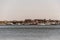 View of harbor from the Boston Waterfront with fishing boat trucks and boats anchored Massachusets