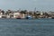 View of harbor from the old Boston Waterfront with fishing boat trucks and boats anchored Massachusets