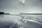 View of a harbor wall and signal lights with a beautiful misty sea in Mossel Bay, Cape Town, South Africa