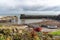 A view of the harbour area in Craster, Northumberland, UK, with fishing boats